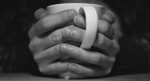 Two hands, one cup
