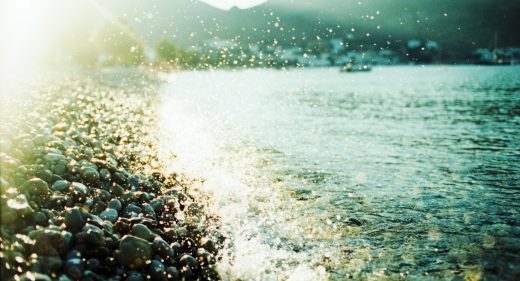 Sunset waves splashing on the shore